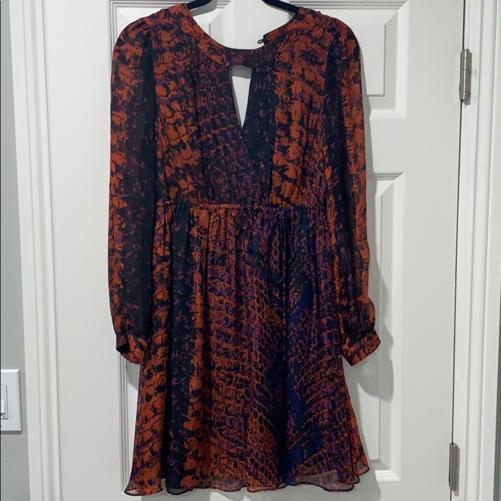 Aryn K flowy mini dress.